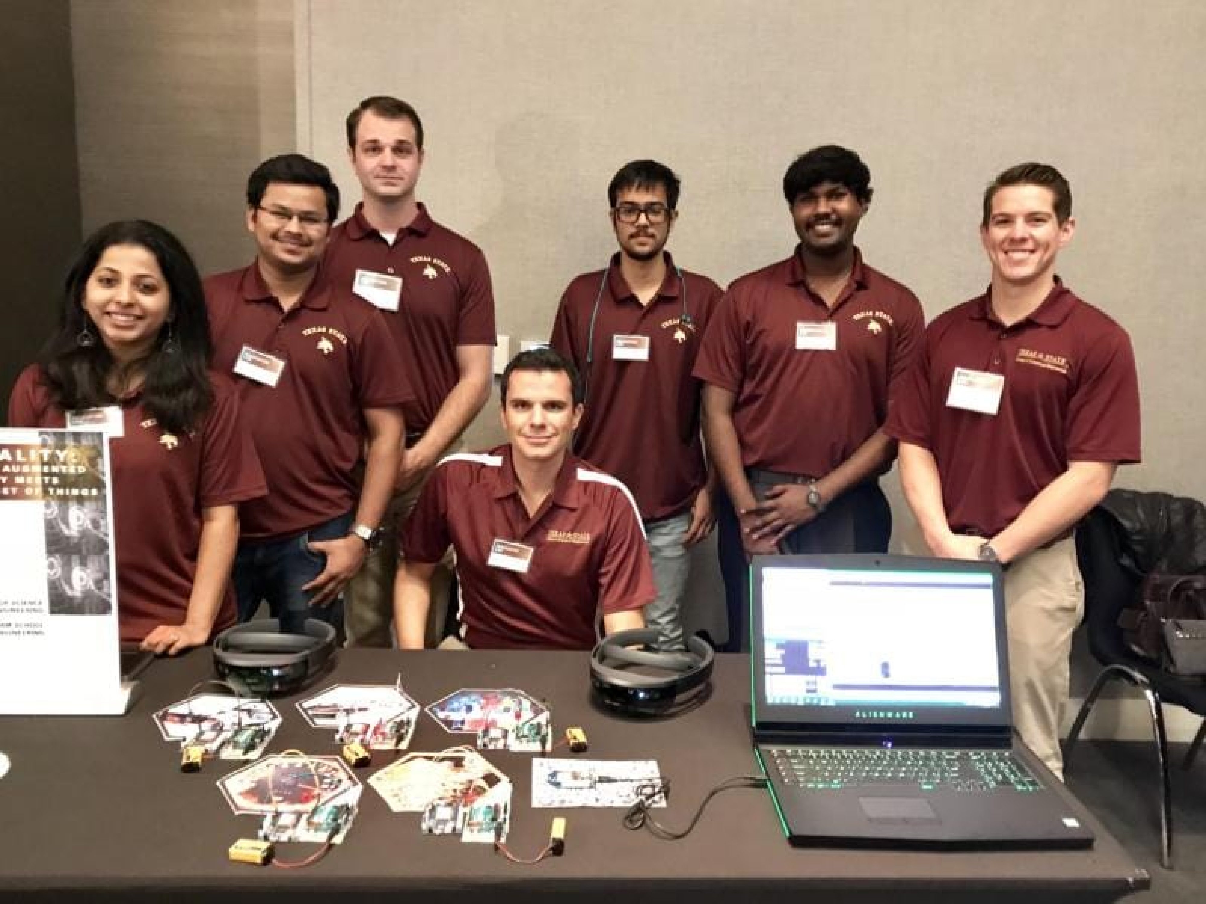 XR research team presenting immersive technology prototypes and mixed reality hardware at a public showcase